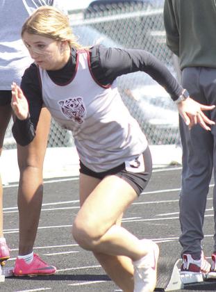 LHS’ Justice Currie gets out to a quick start in the girls’ 100 M. Dash event. Paula Jasa/Republican