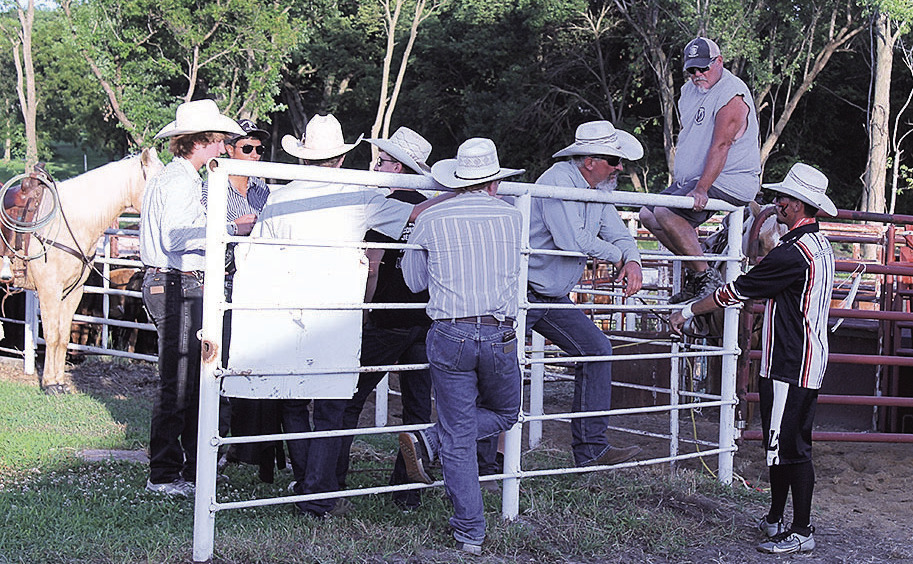 Dan Whitney, better known as 'Larry the Cable Guy' chats with performers before night one of the rodeo.