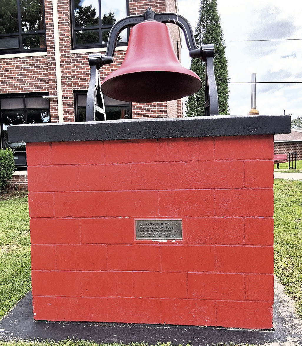 The bell outside Pawnee City Public School, where the time capsule resides