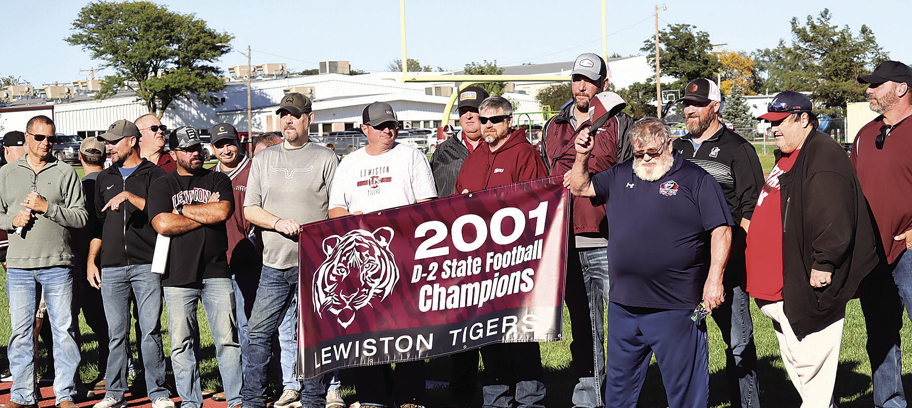 Coach Neil Woofter tipping his cap to the Lewiston fans and everyone who gathered to honor his 8-man Football Hall of Fame celebration. Photo by Paula Jasa former Sports Editor for Pawnee Republican