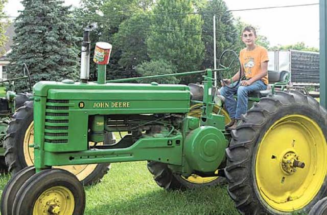 Norman McHenry and his 1952 John Deere B tractor. He won a People’s Choice Award at Harvest Bash one year. He got a trophy that was bigger than he was. He was just a little kid then. Ray Kappel/Republican