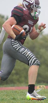 LHS’ Tristen Ray takes off on a huge run against Sterling on Friday. Paula Jasa/Republican