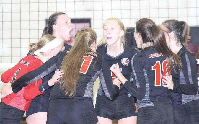 Pawnee City players from left, Ashlynn Hartman (#1, left) Austin Branch, Sierra de-Koning (#5), Larissa Tegtmeier, Reyana Tegtmeier (#16) and Madison Branek (#11) celebrate a point in a hard-fought first match against Sterling on Thursday night. The Lady Indians lost in two contested sets, 24-26, 14-25. Paula Jasa/Republican