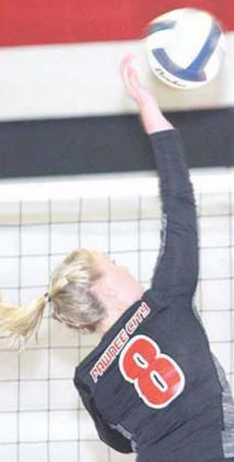 P.C.’s Reagan deKoning (#8) puts down a kill against Sterling in Pawnee City’s second game of the triangular. Paula Jasa/Republican