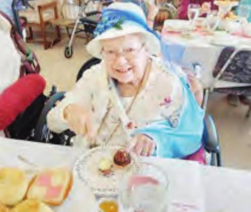 Dorothy Penkava of Table Rock enjoys the tea