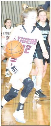 LHS’ Katelyn Sanders (#12) heads to the hoop. Paula Jasa/Republican