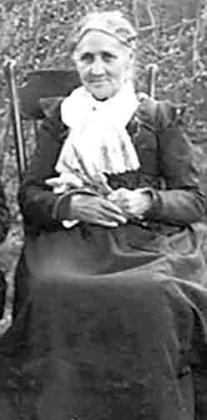 Above: Caroline Dimon in 1902, at age 76, holding lilies. One can only wonder how beautiful she was as a young woman, as even at age 76 she was lovely.
