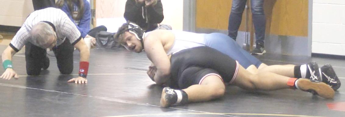 HTRS/P.C.’s Ty Faulks (on top) goes for a pin at the JCC Thunderbird Invitational over the weekend. Faulks won the 285 lb. division on Saturday. photo courtesy of Ann Wickett/Tecumseh Chieftain