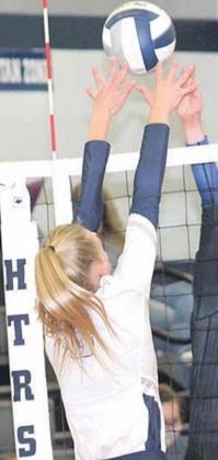 HTRS’ Abby Stalder (#3) goes up for an outside block against NCL in the first round of the Pioneer last Monday night. Paula Jasa/Republican