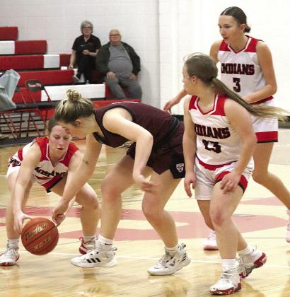 P.C.’s Cara Pierce (left) goes after the ball as LHS’ DeLanye Currie (center) brings down the ball against P.C.’s press. Also pictured are P.C.’s Ericca Gyhra (#13) and Kinsley Benson (#3). Paula Jasa/Republican