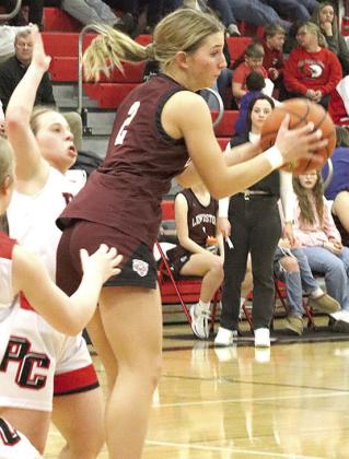 LHS’ Justice Currie (#2, right) pulls in a rebound against Pawnee City last Tuesday night. Paula Jasa/Republican