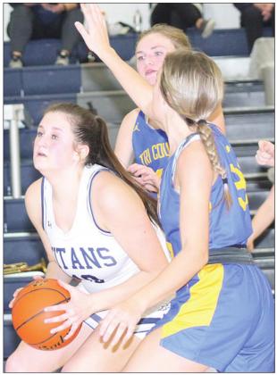 HTRS’ Jacey Leech gets ready to put up a shot against Tri-County in the Lady Titans’ 48-44 thrilling triumph. Paula Jasa/Republican