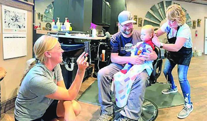 Brittany Summeberg keeping Luka occupied, Mark Sunneberg holding Lukas, Lukas and Missy Freeman