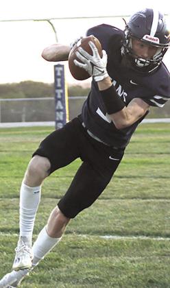 HTRS’ Brogan Dunlap (#3) brings down a tough catch on the sidelines early in the game against Elmwood-Murdock. He also left the game late with an ankle injury. Paula Jasa/Republican