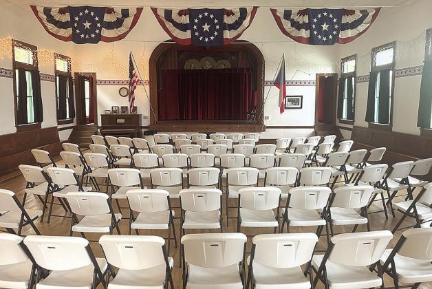 Chairs fill the dance floor at the DuBois ZCBJ Hall in anticipation of a program of classical music in Czech.