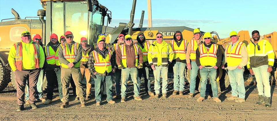 Nebraska Department of Transportation workers pose for a picture before beginning the application of the BaseBindX Photo courtesy of Nebraska Department of Transportation