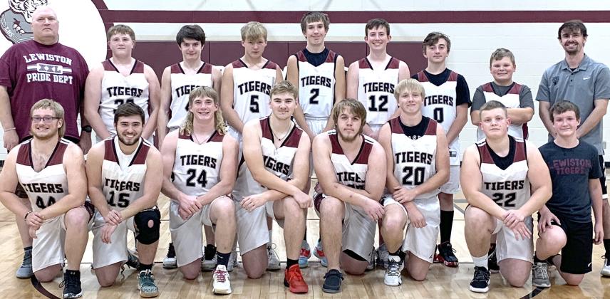 Members of the 2022-23 Lewiston Boys’ Basketball Team are front, from left: Jaxon Janssen, Brady Bledsaw, Tristen Ray, Jip Van De Voort, Freddie McMurray, Caleb Rule, Dejan Markwort, Grady Weyers, s.m. Back row: Asst. Coach Matt Sholty, Brady Wright, Alex Pospichal, Everett Bohling, Ashton Sanders, Cooper Swendener, Tristen Wagner, Taven Borcher, Head Coach Kohlton Gabehart. Not pictured: Ty Arena.