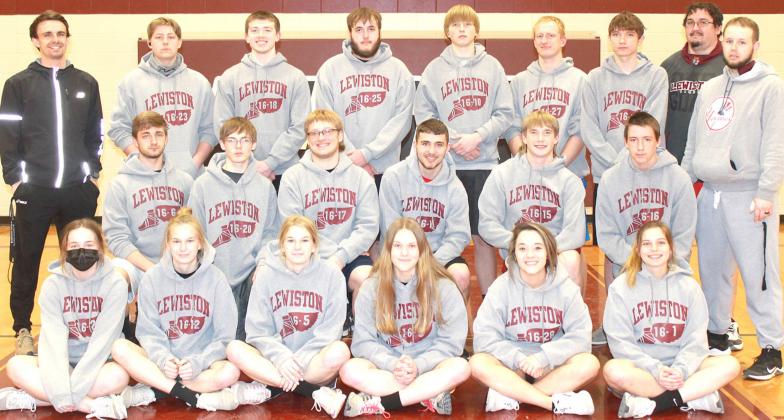 Members of the 2021 Lewiston Track Team are front, from left: Carleigh Weyers, Katelyn Sanders, Meagan Sanders, Emma deKoning, Kelsay Bledsaw, Masyn Arena. Second row: Zach Robinson, Ethan Bohling, Jaxon Janssen, Brady Bledsaw, Tristen Ray, Johnathan Burgett, Coach Kyle Ashe. Back row: Head Coach Kohlton Gabehart, Ty Arena, Hayden Christen, Ethan Horne, Caleb Rule, Jon Janssen, Kienen Creek, Coach Alex Callan. Not pictured: Freddie McMurray, Persefenie Woutzke, Jaszmyne Charles.