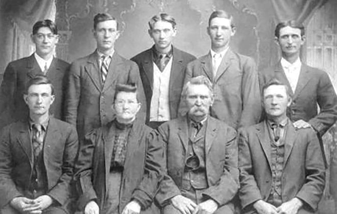 Babe Carter, his parents, and six brothers. Sadly, I don’t know which is him. He’d be one in the back with his crippled hand out of sight.