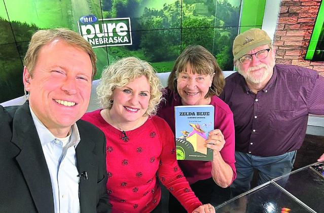 From Left:Jon and Taryn Vanderford, Sharla, and Jim Koudelka of Lincoln. Sharla Sitzman, Table Rock and Jim Koudelka, Lincoln spent a morning at the Pure Nebraska studios in connection with their volunteer work with the UNL Friends of Opera. “Show your book!” Jim said, and Jon quipped, “We’ll have to do a segment about it!”