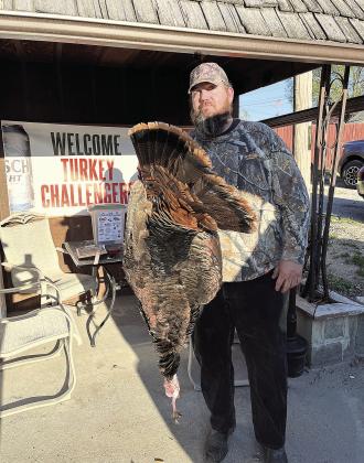 Third Place winner in the Chunky Thunder Chicken Jon Howard, who also won the Rock Island Armory .20 gauge in the drawing.