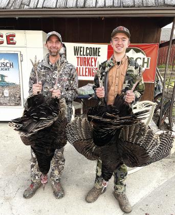 Adult Division winner Everett Bender (left) and the Chunky Thunderchicken Champion Zachary Bender (right)