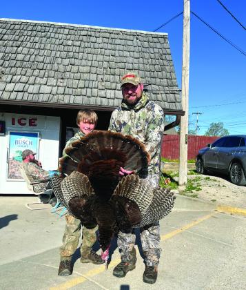 Colton Sedivy (left) and his dad with the second of Colton’s birds. Colton finished in third place.