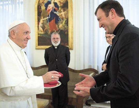 Rev. Monsignor Richard Allen Gyhra, who grew up in rural Pawnee County, NE, meets with Pope Francis