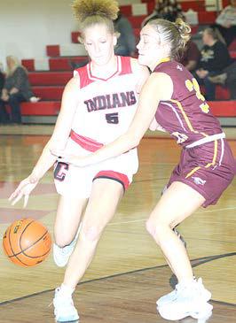 P.C.’s Maddy Osborne drives past a Sterling defender in Friday night’s game against the Lady Jets. Paula Jasa/Republican