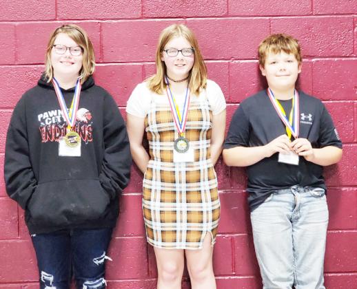 3rd/4th Grade Division: (l to r) Landon Rohmeyer, Lewiston, 2nd place, Abigail Johnson, Pawnee City, 3rd place, Chloe Bogues, Lewiston, 1st place