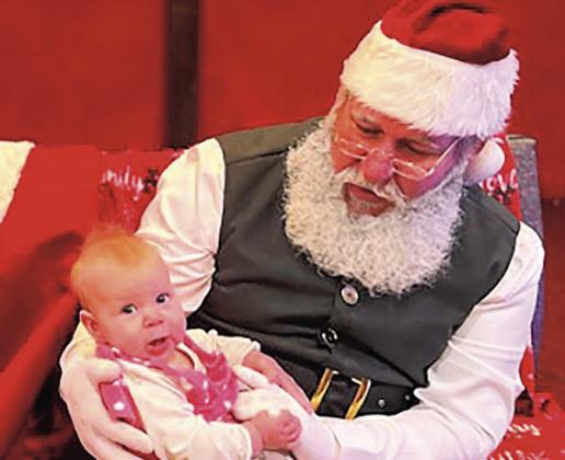 Elise Tyler visits Santa for her first Christmas