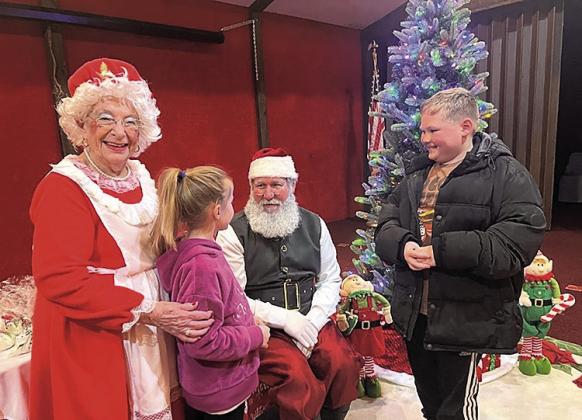 Owen and Everlynn Kreifel with Mr. and Mrs. Claus