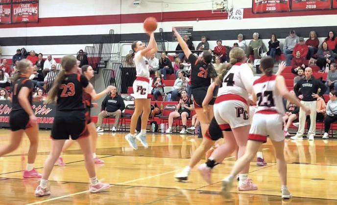 Kinsley Benson, #3, with a pull-up jumper for two of her game high 14 points. photo by Joe Norman