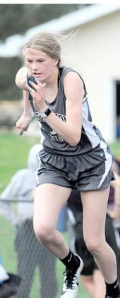 P.C’s Larissa Tegtmeier and Madison Lytle get off to a good start in the 800 M. Run while LHS’ Meagan Sanders starts out of the blocks in the 100 M. photos courtesty of Ann Wickett and Luke Nichols