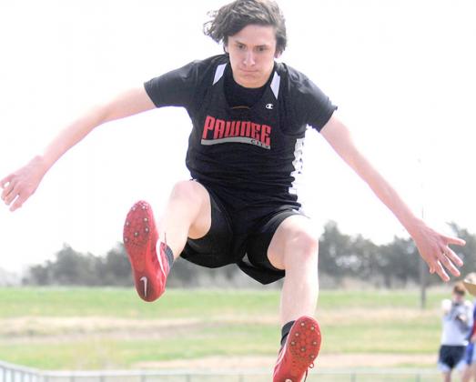 P.C.’s Hunter Johnson jumps 33’11 1/2” in the boys’ Triple Jump event. photo courtesy of Luke Nichols/Beatrice Daily Sun