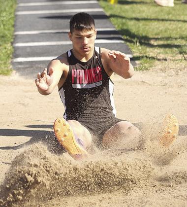 Paula Jasa/Republican P.C.’s Trey Kling makes a sand splash in the boys’ Triple Jump event.