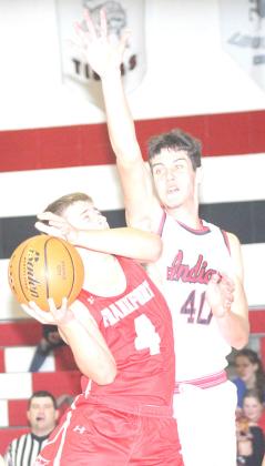 P.C.’s Oscar Machini (#40, right) goes up for a block against a Frankfort, Ks. player on Friday night. Paula Jasa/Republican