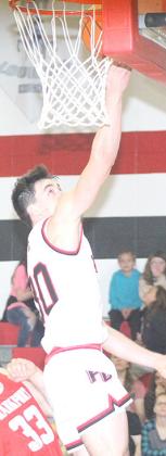 P.C’s Jett Farwell scores on a steal and layup against Frankfort, Ks. Paula Jasa/Republican