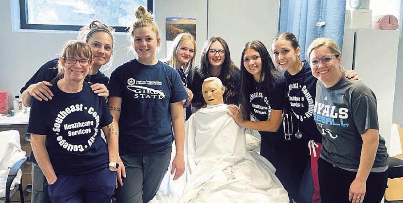 Pictured are students: Jenny Ouding, Leann Johnson, Delayne Currie, Anna Meints, Riley Hock, Naomi Rodriquez, Logan Maloley, and Instructor Kelsey Johnson, RN.
