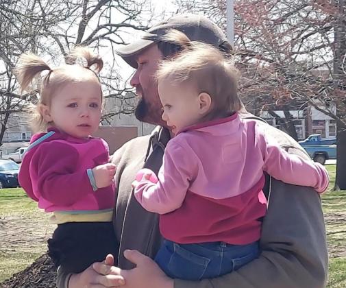 Marshal Freeman with his twins Jenna and Lauren