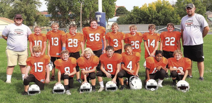 3-4th grade SE NE Tigers Team: (Back-standing) Coach Heath Finke, Brett Seematter, Noah Marr, William Tichy, Jacob Jones, Gus Glathar, Robert Arnold, Ryker Holliday, Noah Herr, Coach Trent Glathar; (Kneeling) Carter Arnold, Bobby Hoffman, Elijah Hoffman, Ryker Townsley, Junior Mena-Rey, Royce Nunez, Chett Hutton