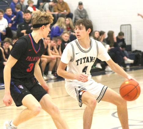 HTRS’ Jack Hunzeker (#4, right) looks to make a pass against a Palmyra defender in Friday night’s last home game. Paula Jasa/Republican