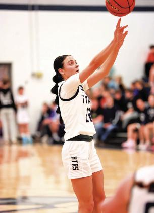HTRS Titan Lillian Bowen outside arc. Bowen made 3 treys in all, 11 points in all. The team had 6 treys.
