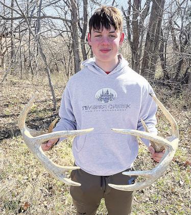 Grayson Gannaway with a matching set of sheds