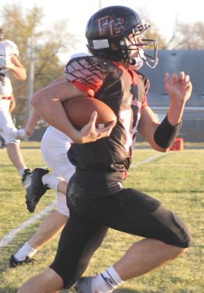 P.C.’s Jett Farwell takes off down the right sidelines on a 60 yard touchdown run. Farwell scored 6 total TD’s against Stuart and had 270 yards of combined offense. Paula Jasa/Republican