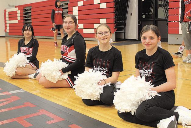 Lovely Pawnee City Cheerleaders (L to R) Tiffany Sampont, Addison Petersen, Ella Wernimont and Lisa Holthus pause their cheering to smile for the camera!