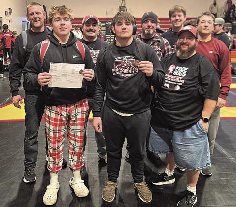 Pawnee City Wrestlers Take home hardware Back row from left: Head Coach Jacob Schuetz, Assistant Coach Kolton Taiclet, Coach Michael Layne, Team Assistant Jesse McLaughlin Front row: Champion Gauge Schuetz, 3rd place Dylan Layne, Coach Jake Otero