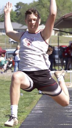 Lewiston’s Cashton Steinacher gets some extra leverage in his leap of the boys’ Long Jump event. Paula Jasa/Republican