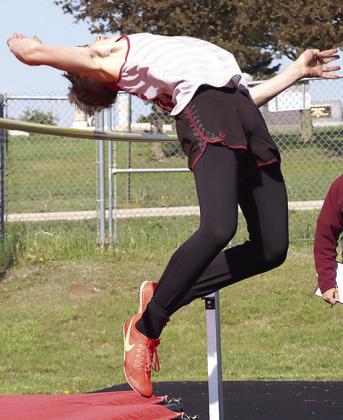 Lewiston’s Payton Heideman attempts to clear the bar in the boys’ Pioneer High Jump event. Paula Jasa/Republican