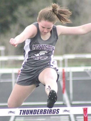 LHS’ Carleigh Weyers clears her last hurdle in the 300 m. event. She placed 3rd with a time of 55.98. Paula Jasa/Republican